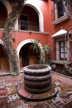 spanish style courtyard and well in mexico